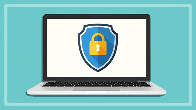 antivirus sofware shield and padlock on laptop on a teal background